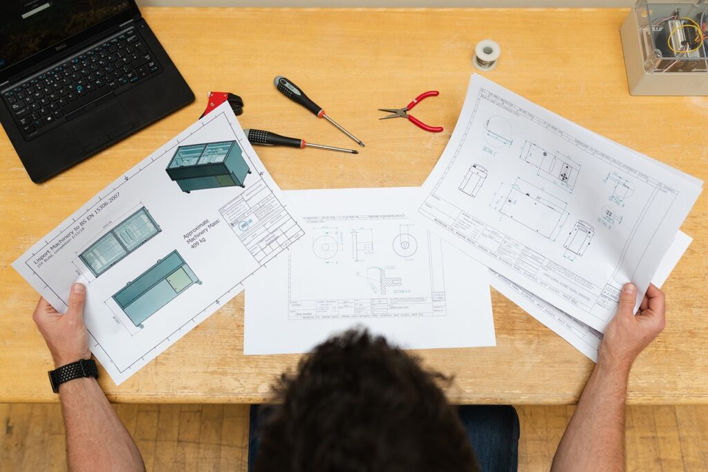 engineering looking at drawings