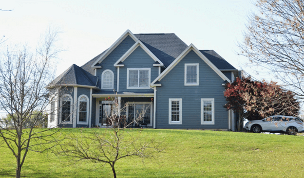 blue house and lawn