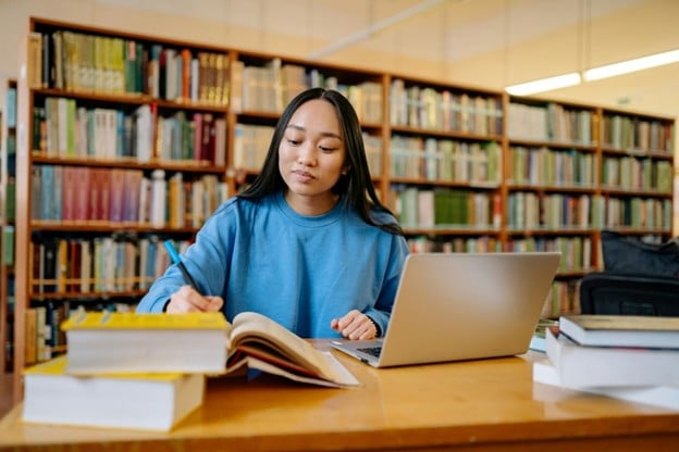 person studying in library