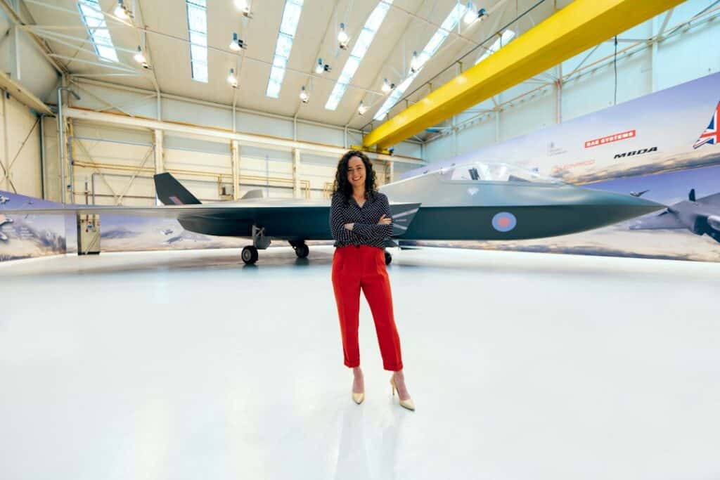 Aerospace engineer inspecting an aircraft in a hangar