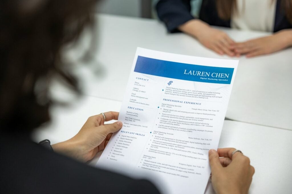 Staffing agency recruiter reviewing a candidate resume