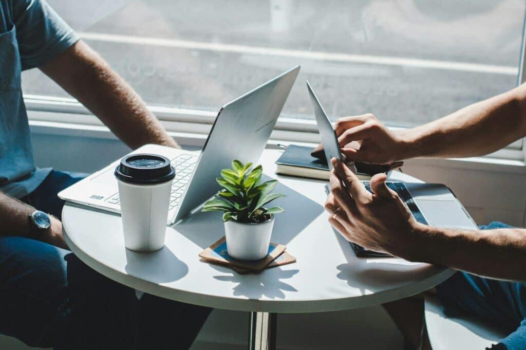 Technical recruiter meeting a candidate over laptops